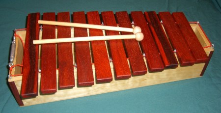Using eyelets to suspend xylophone bars like in the  DIY marimba plans